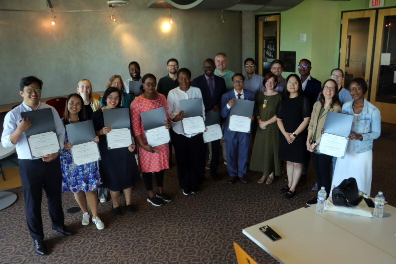 Fellows and instructors pose for a photo following the training course.