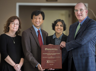 Rettsyndrome.org’s Gordon Rich, right, with Vanderbilt Rett Syndrome researchers Colleen Niswender, Ph.D., left, Cary Fu, M.D., and Sarika Peters, Ph.D. (photo by Susan Urmy)