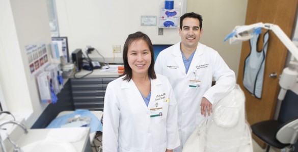Tyler Ames and Julie Rezk with Division of Dentistry by : Susan Urmy