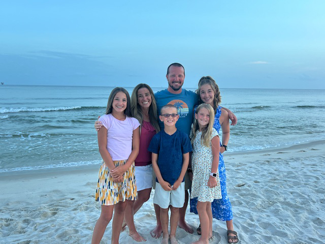 The Ross family enjoys a beach day together. Jaycey, left, has made a full recovery after being hospitalized with a serious E. coli infection. (photo courtesy of Brittany Ross)
