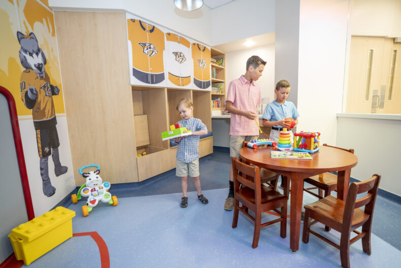 Patients explore the new Nashville Predators playroom during move-in day for the 10th floor opening of Monroe Carell Jr. Children’s Hospital at Vanderbilt. (photo by John Russell)