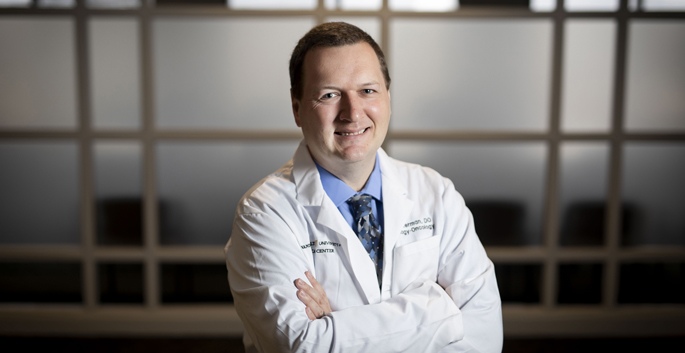 Travis Osterman, DO, MS, is working to establish common data standards for oncology clinicians and researchers.