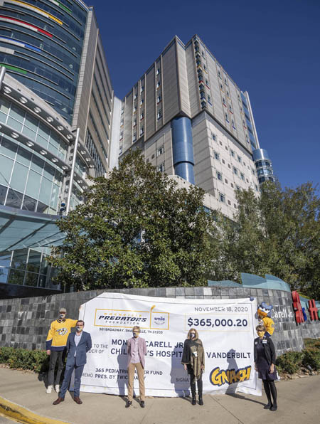 On hand for the presentation of the Predators’ gift were, from left, goalie Pekka Rinne, Twice Daily’s Eric Stokes, the Predators’ Michelle Kennedy, and VUMC’s Debra Friedman, MD, and Meg Rush, MD.
