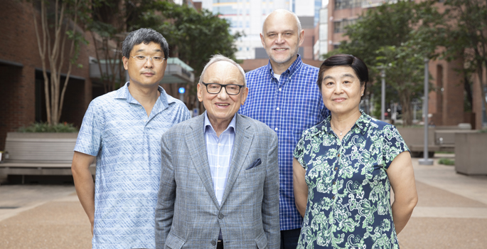 The team studying how to control sepsis in the lungs and kidneys includes, from left, Huan Qiao, MD, PhD Jacek Hawiger, MD, PhD, Jozef Zienkiewicz, PhD, and Yan Liu, MD, MS. (photo by Erin O. Smith)