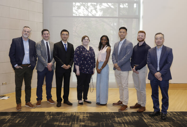 From left are Christopher Williams, MD, PhD, associate director of Research Education at VICC, Michael Robinson, MD; Guochong “Damon” Jia, PhD, postdoctoral scholar of the year, Katie Brown, PhD, co-chair of the Vanderbilt-Ingram Scientific Symposium, Candace Grisham, MS, co-graduate student of the year, Xiaopeng Sun, PhD, co-graduate student of the year, Jared Rhodes, co-chair of the Scientific Symposium, Ben Ho Park, MD, PhD, director of VICC. (photo by Donn Jones)