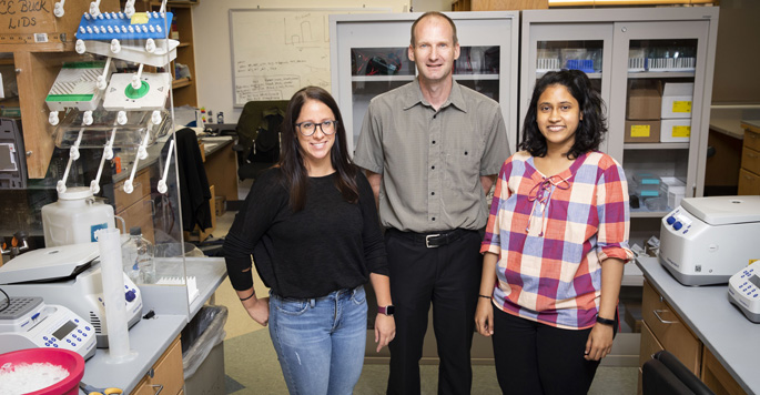 Madison Adolph, PhD, left, David Cortez, PhD, and Archana Krishnamoorthy are studying fundamental processes involved in DNA replication.