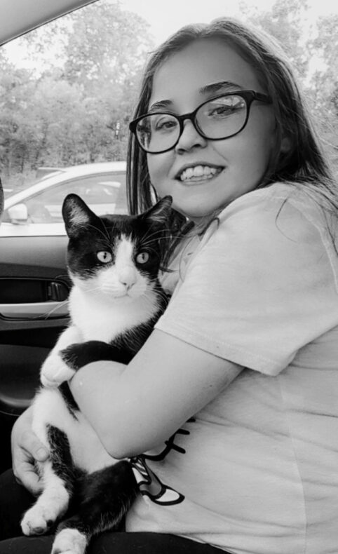 Transplant patient Jordyn Williams with “Mr. Whiskers.”