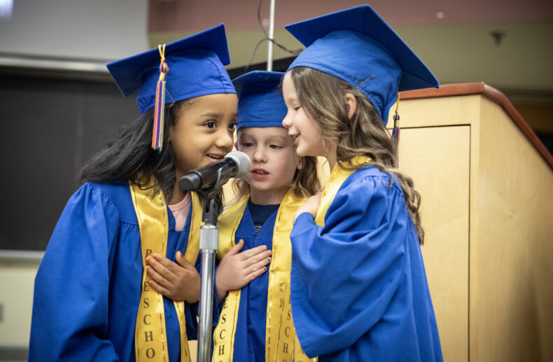Mama Lere Hearing School students lead the Pledge of Allegiance.(photo by Erin O. Smith)