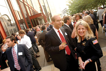 Jeanne Yeatman, right, program director for LifeFlight, shares a laugh with attendees of the Vanderbilt LifeFlight 20 year celebration at the Country Music Hall of Fame on Monday night. 
photo by Dana Johnson