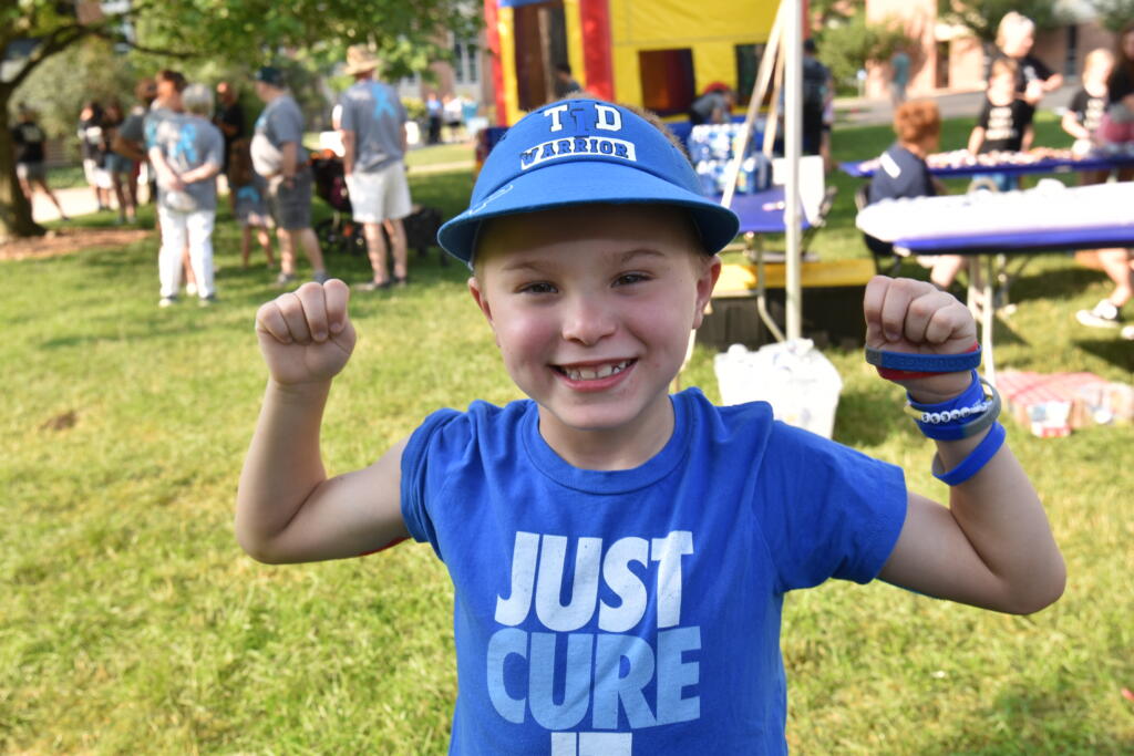 Boy With Type 1 Diabetes at a Fundraising Community Event