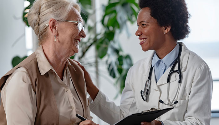 Senior patient speaking with doctor