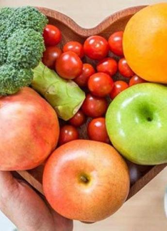 Healthy food in a heart-shaped bowl