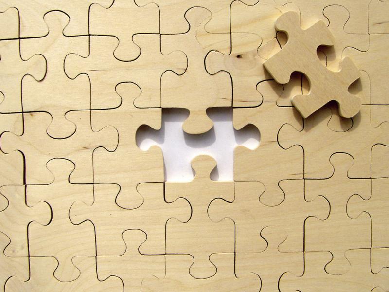 Puzzle with one piece missing