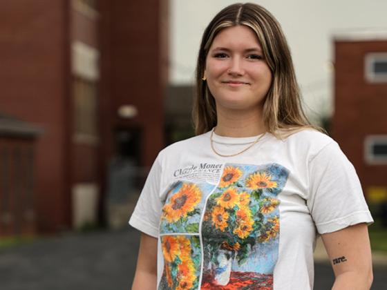Raven Whitaker Standing on UK's Campus