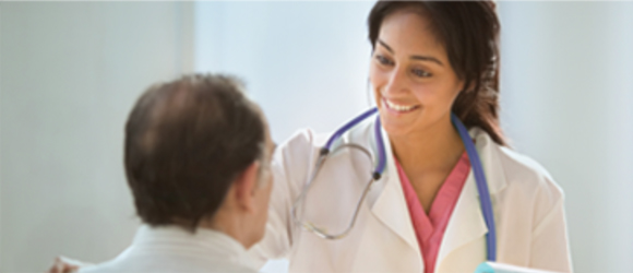 Doctor talking with patient