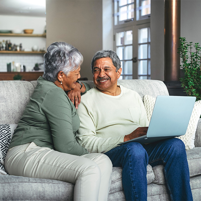 Older couple using computer