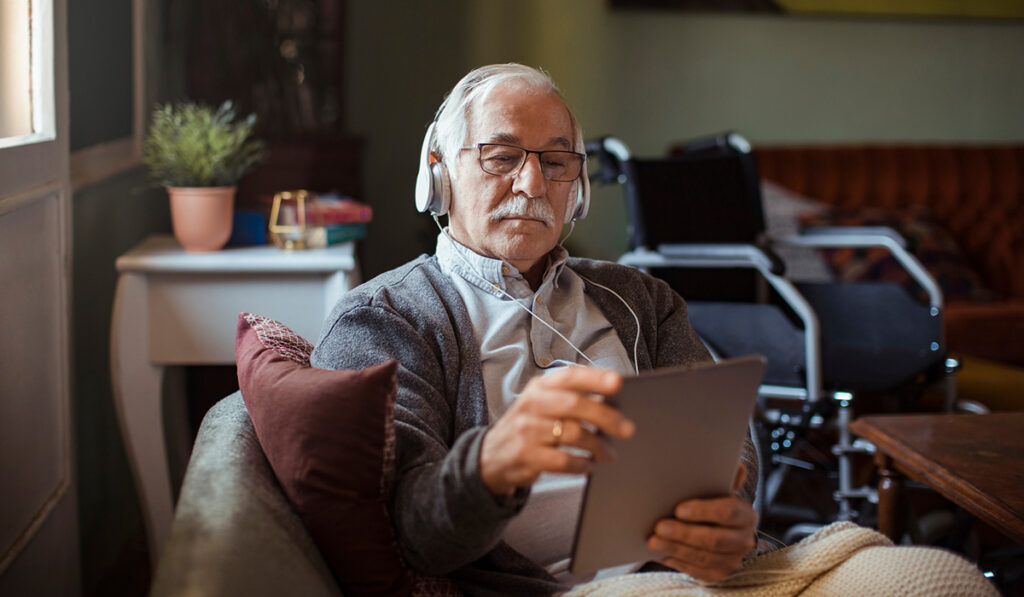 Older adult using iPad