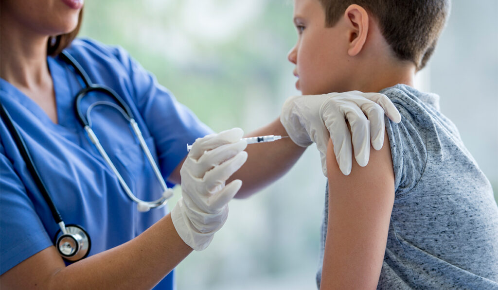 Child getting flu shot