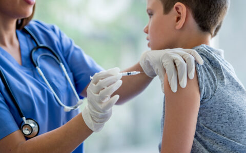 Child getting flu shot