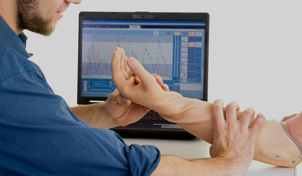 Doctor fitting a prosthetic on patient