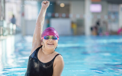 Young child swimming