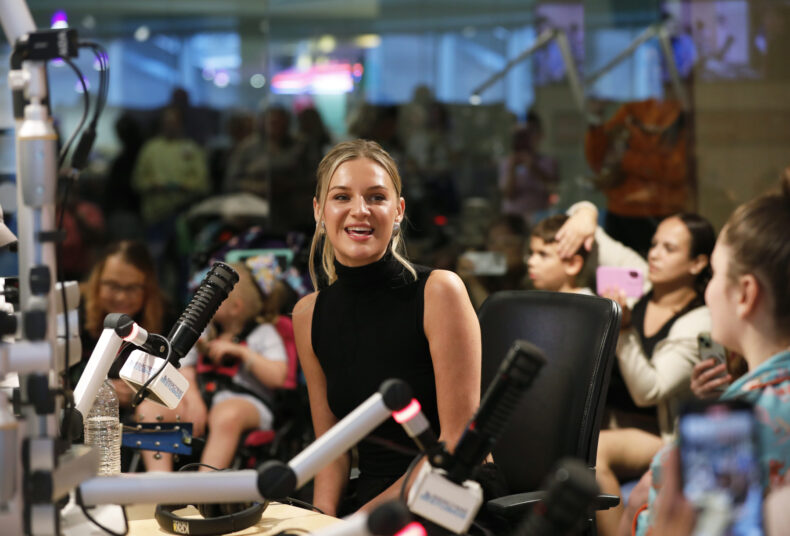 Country music star Kelsea Ballerini talks with patients during her visit to Monroe Carell Jr. Children’s Hospital at Vanderbilt. (photo by Donn Jones)