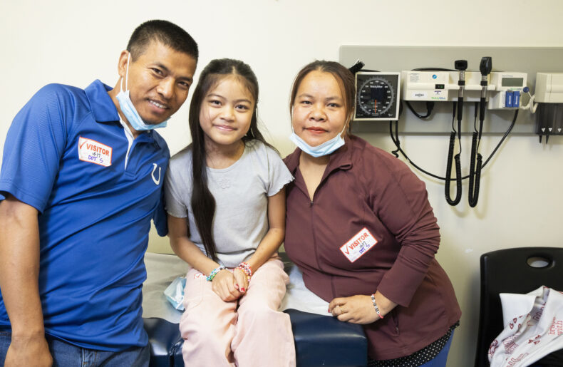 Patient Van Sung with her parents, Nathan and Rem Kumthar. (photo by Susan Urmy)