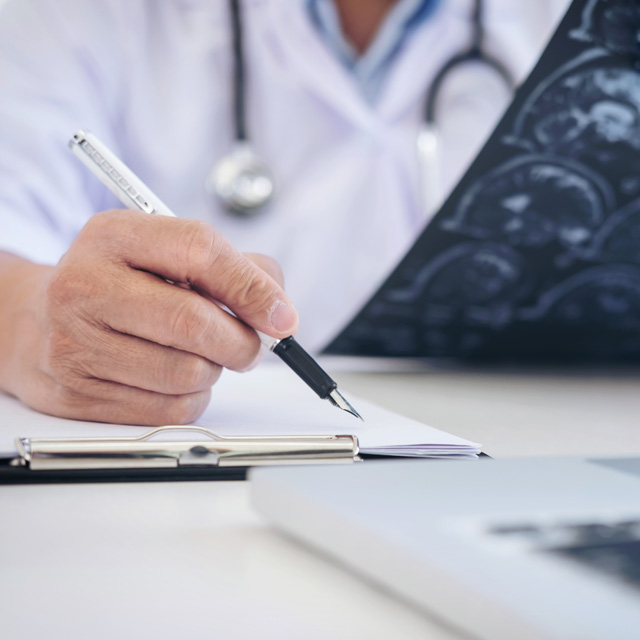 Epilepsy physician analyzing patient's seizure history and diagnosis