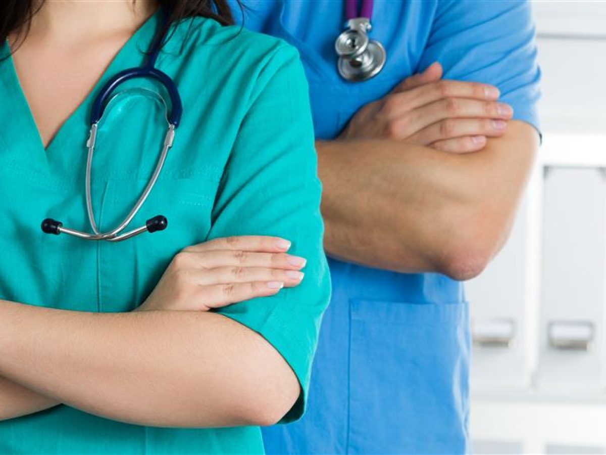 doctors with scrubs and stethoscope