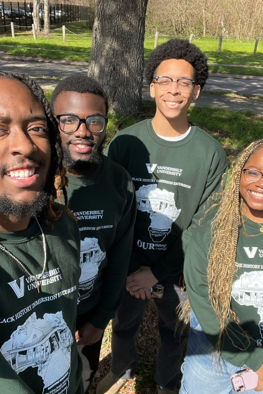 Students smiling and supporting the BCC at an event.