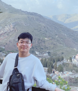 Headshot of Henry, a student coach at the English Language Center.