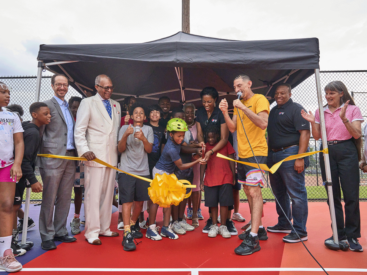 Watkins Park dedication of HOPE basketball Court with painting of Perry Wallace.