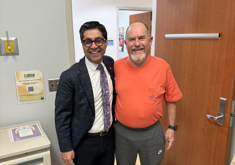 Patient Johnny Cleveland, right, with Kamran Idrees, MD, MSCI, MMHC.