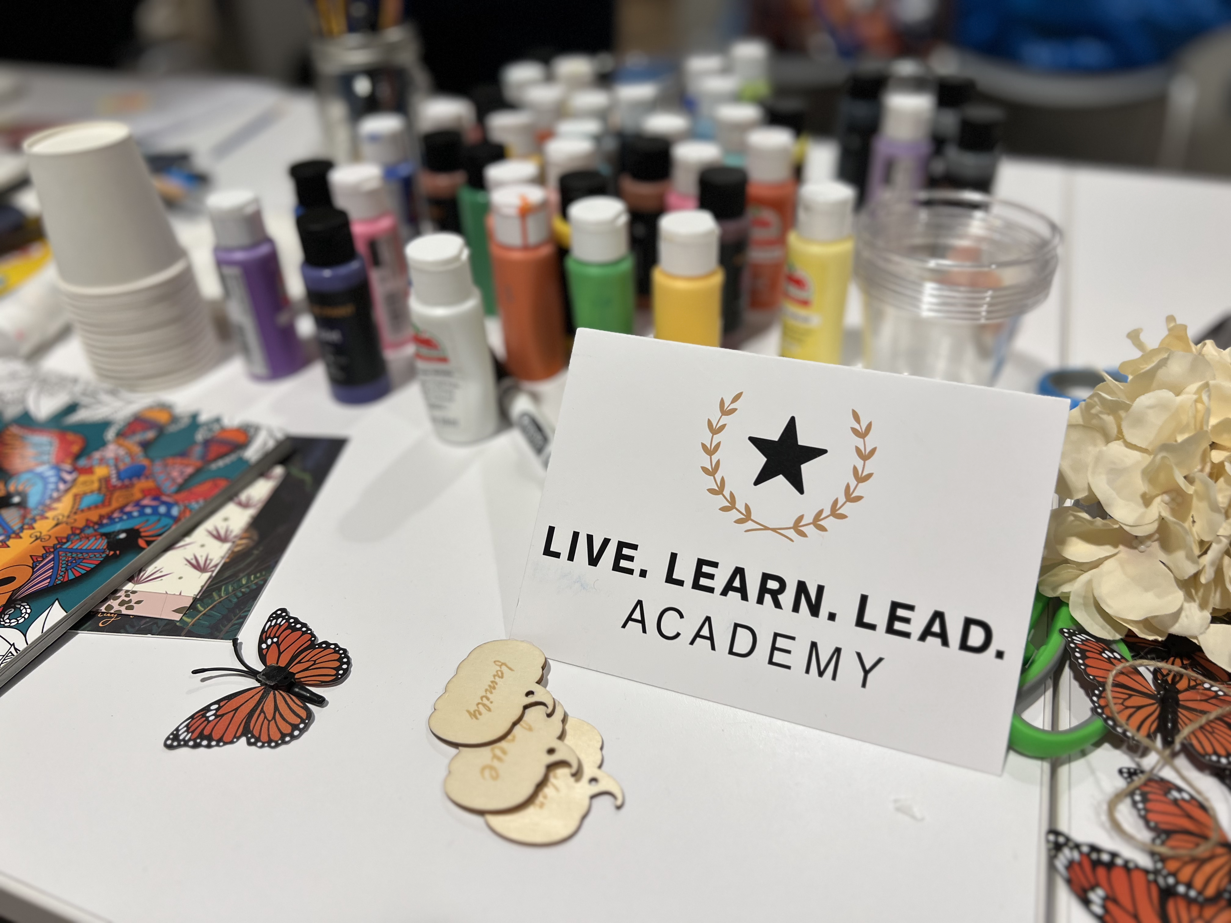 Students bring crafts to complete with Hope Lodge residents.