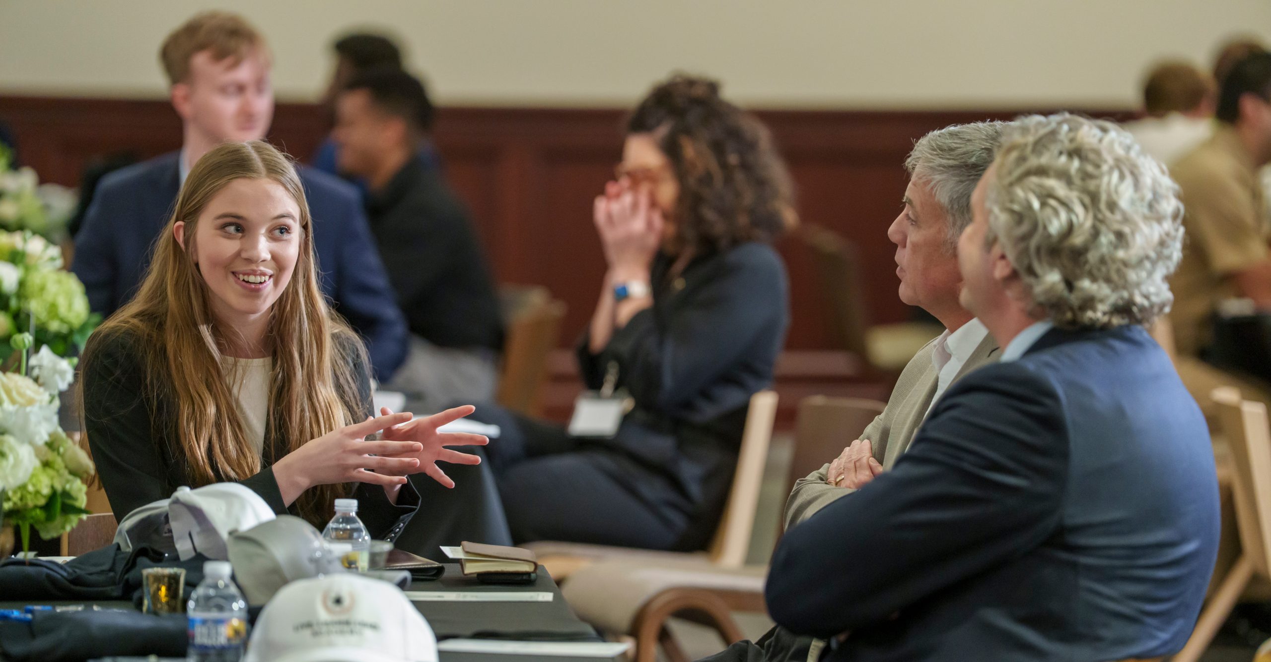 Students discuss during the 2025 Symposium.