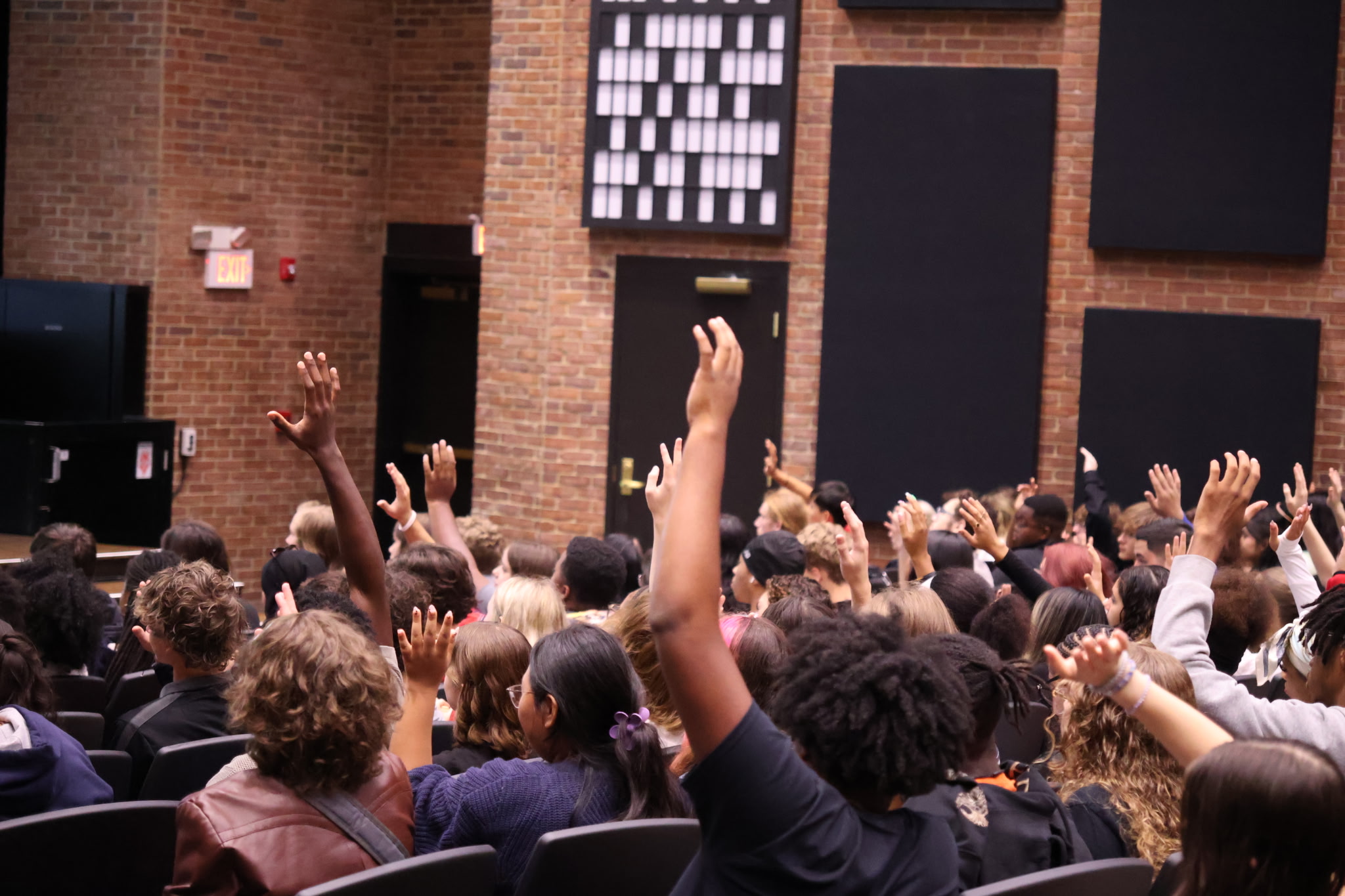Students Raising Hands