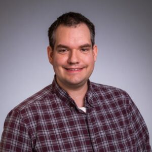 Man standing smiling