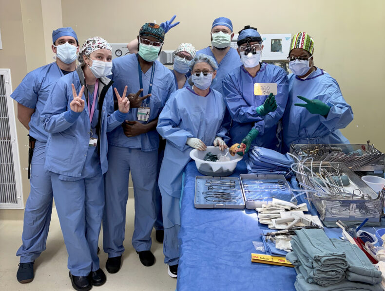 Members of the transplant team pose for a photo after surpassing 200 adult and pediatric heart transplants. (photo courtesy of Ashish Shah)
