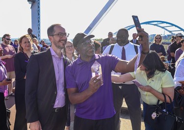 Mayor Freddie O'Connell and others posing for self-portrait