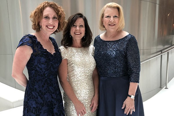 Drs. Jennifer Wilbeck, April Kapu and Pam Jones in formal attire