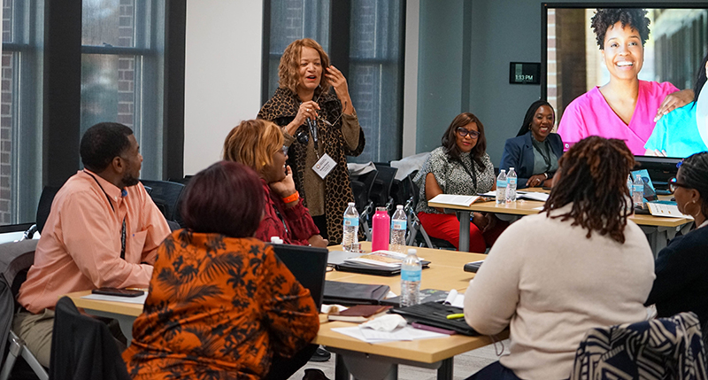 academy attendees engaged in conversation
