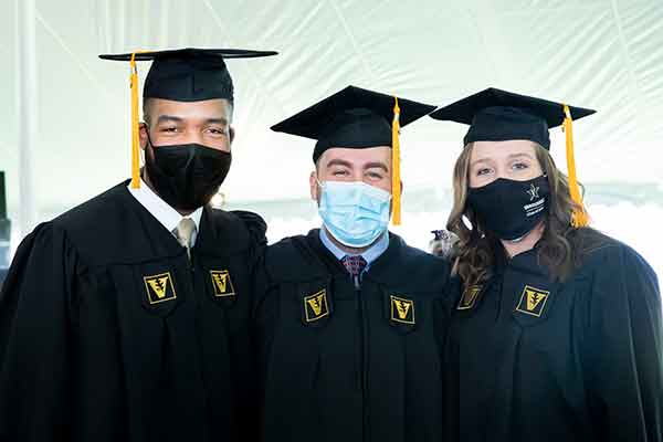 MSN graduates and Adult-Gerontology Acute Care NPs Michael Booth, Austin Rockenhaus and Ashley Arlington.